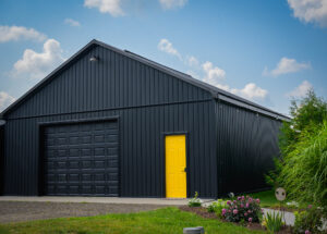 Stunning shop with black board and batten vinyl siding