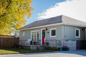 Vinyl Board and Batten Siding with pre-cast stone veneer