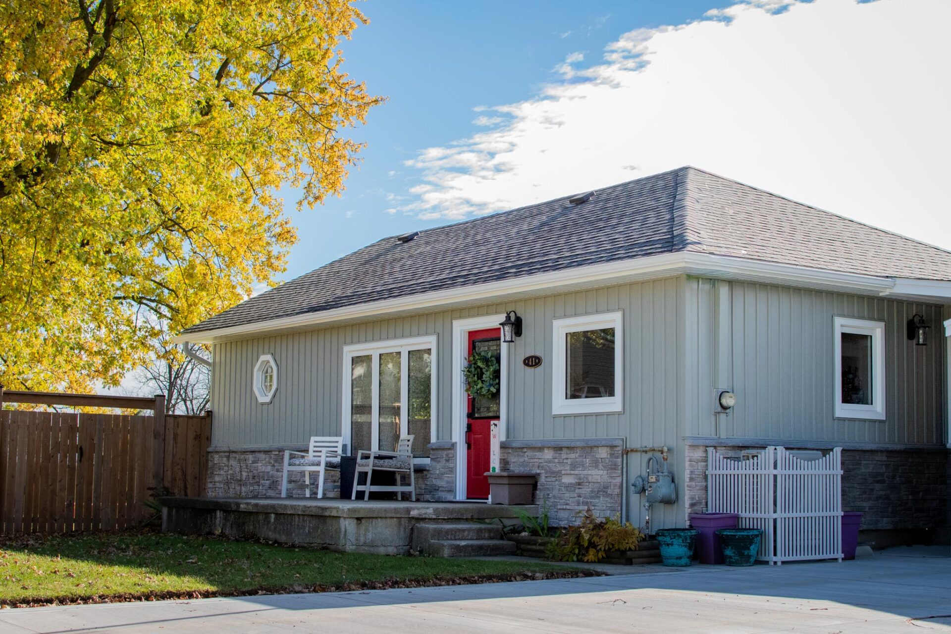 Vinyl Board and Batten + Stone Veneer Vinyl Board and Batten + Stone Veneer