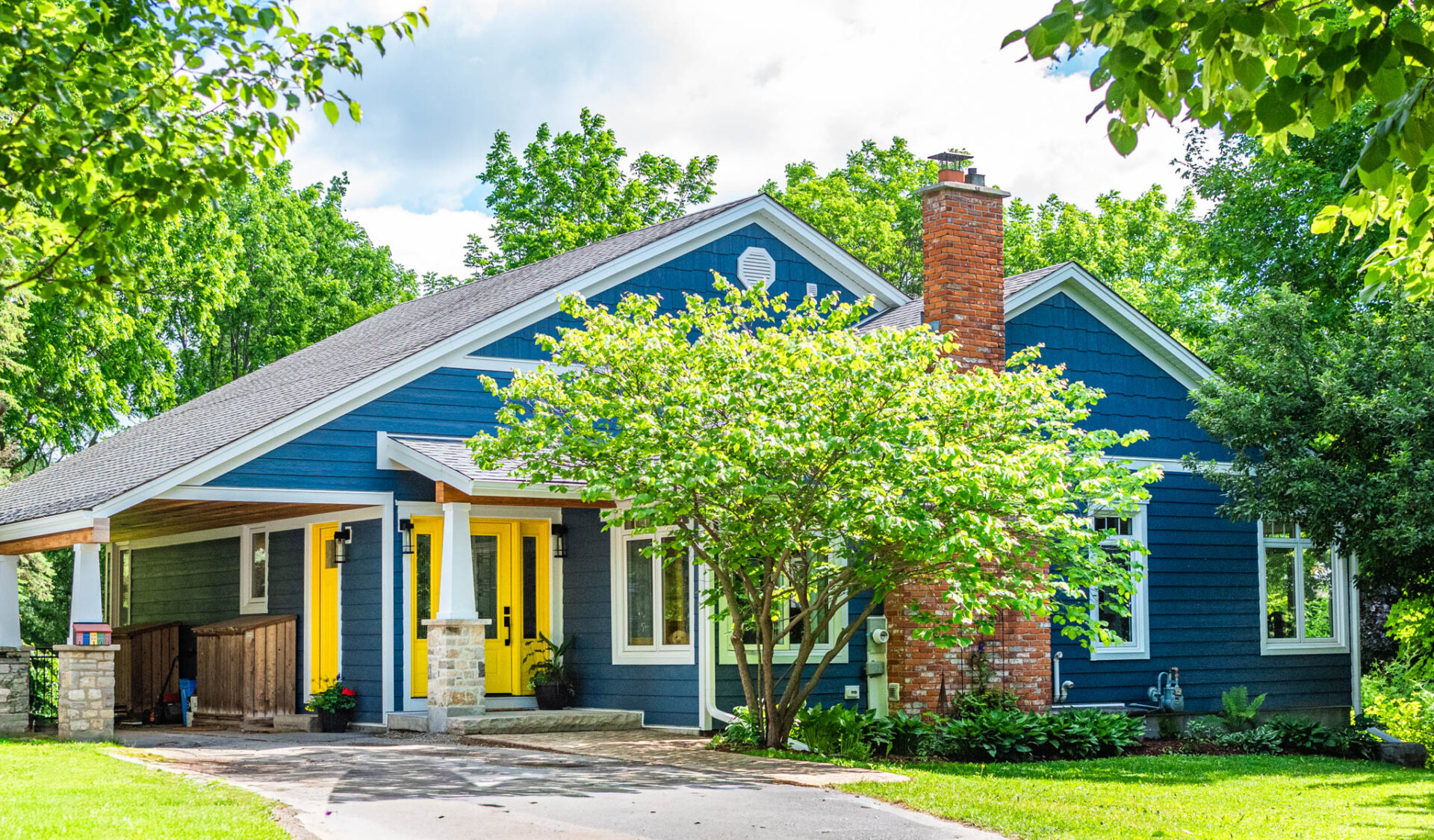 Fergus home with new LP Smartside Horizontal Siding in Rapids Blue with white trim